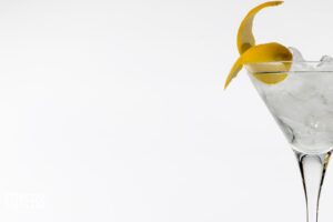 Martini with lemon twist garnish on a glass
