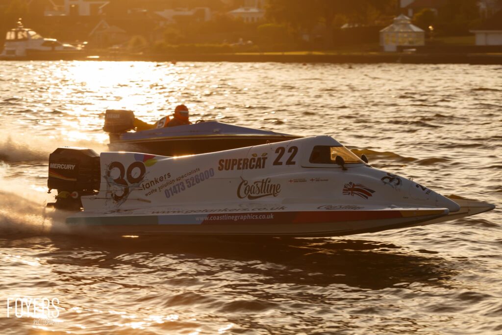 Supercat 22 speedboat racing across choppy water in golden sunlight, with Mercury outboard motor visible.