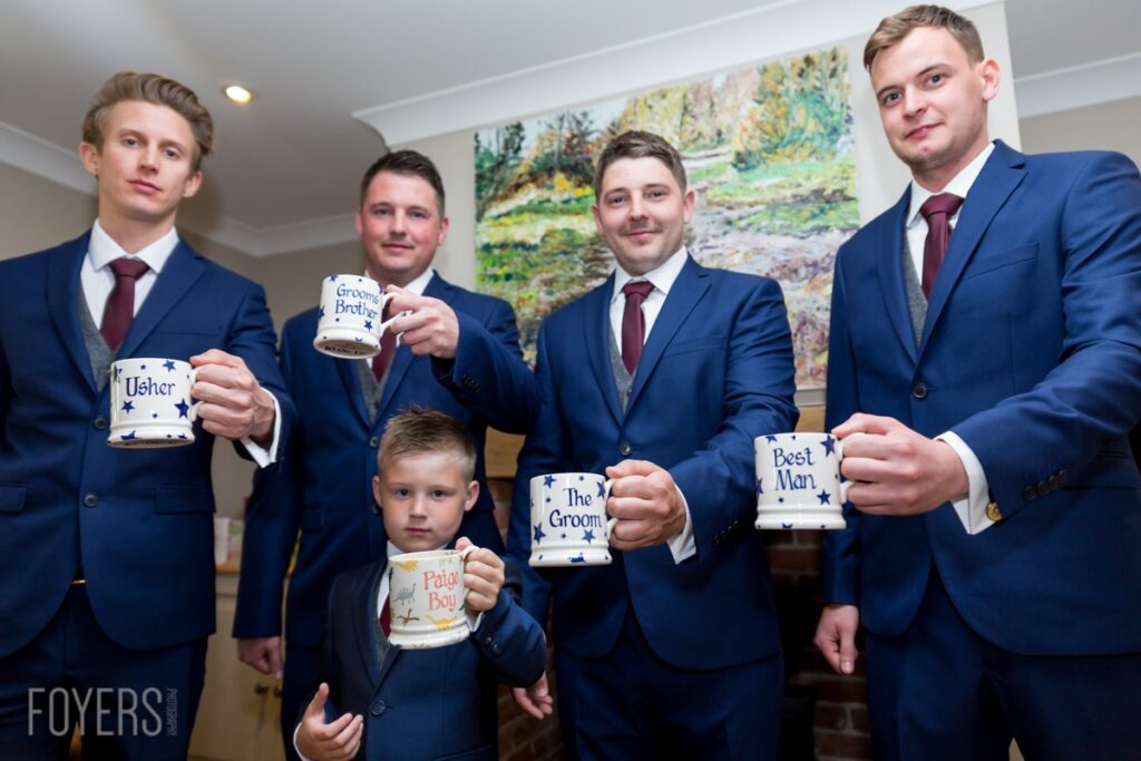 The groom and groomsmen with there Emma Bridgewater, mugs