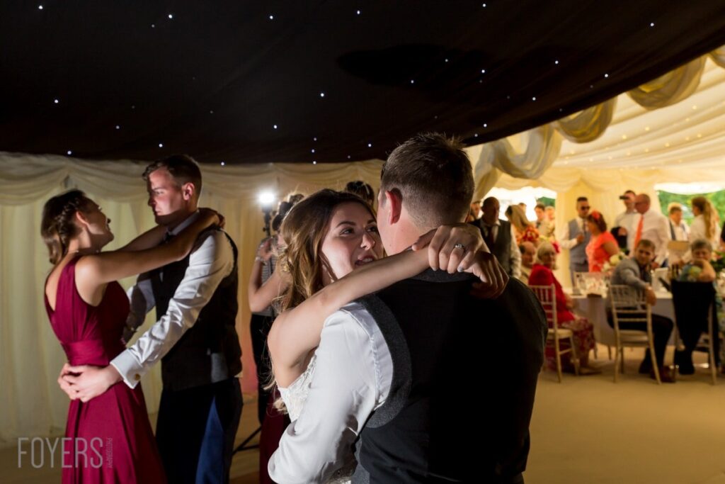 Ally and Alex dancing gracefully to their chosen song, Only Love by Ben Howard with guest