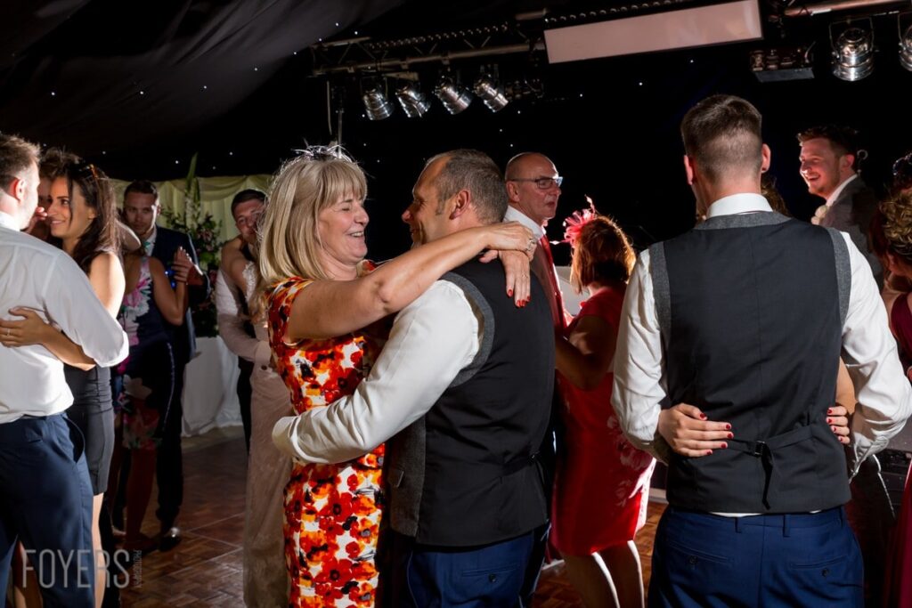 family dancing with Ally and Alex dancing gracefully to their chosen song, Only Love by Ben Howard