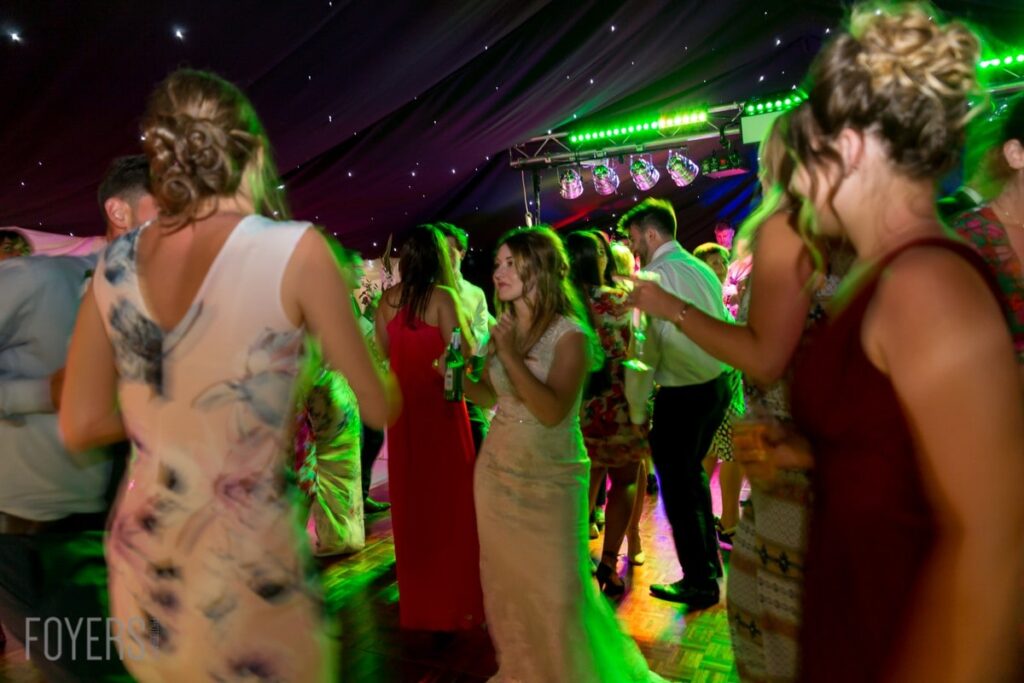 Bride and friend dancing to The brilliant Lee Vasey Band played throughout the night
