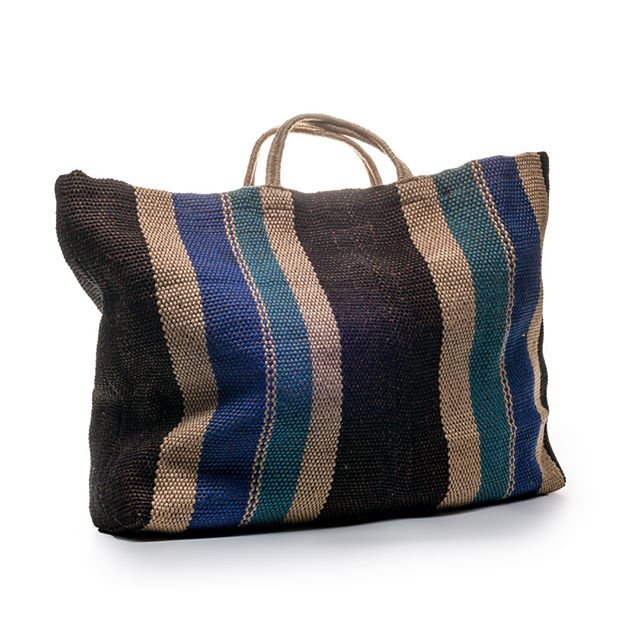 Striped woven tote bag with handles in navy, teal, cream and charcoal colours against a white background.