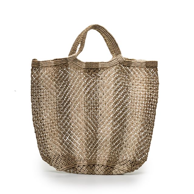 A beige mesh tote bag with diagonal woven pattern and dual handles, displayed against a white background.