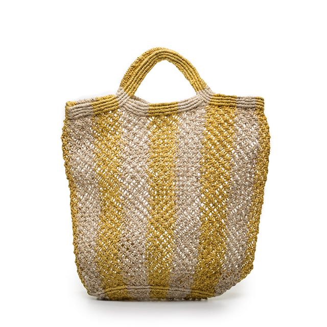A woven tote bag in gold and silver mesh with striped pattern and rope handles, displayed against a white background.