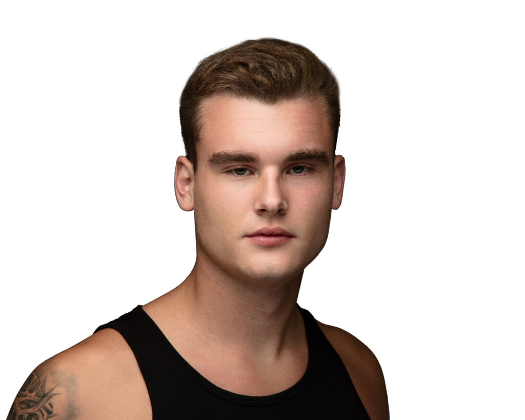 Young man in black tank top, tattoo visible