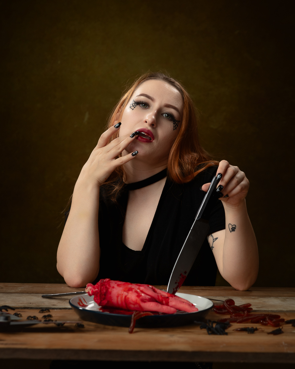 Gothic woman with fork and knife, artistic style.
