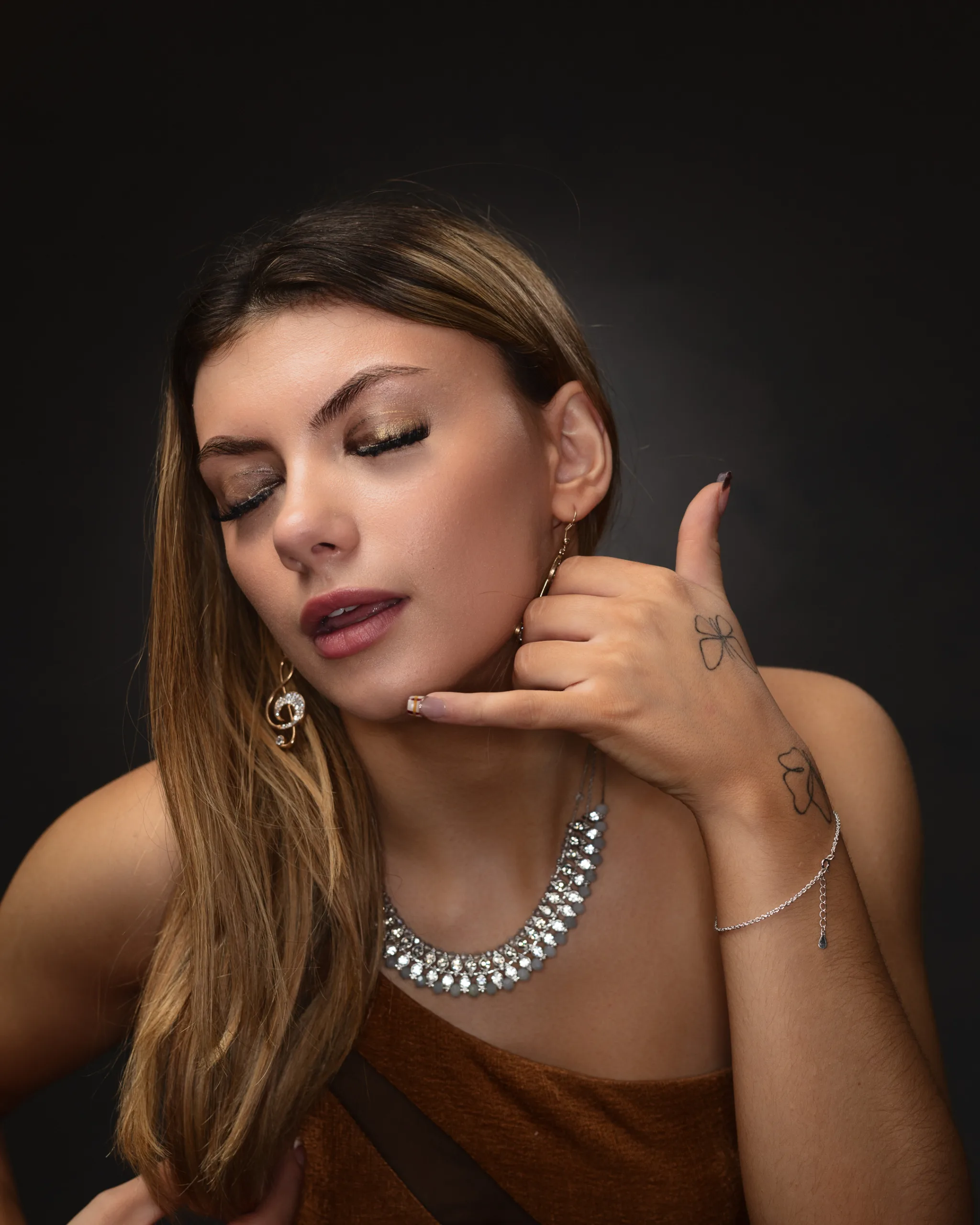 Woman posing with call me hand gesture