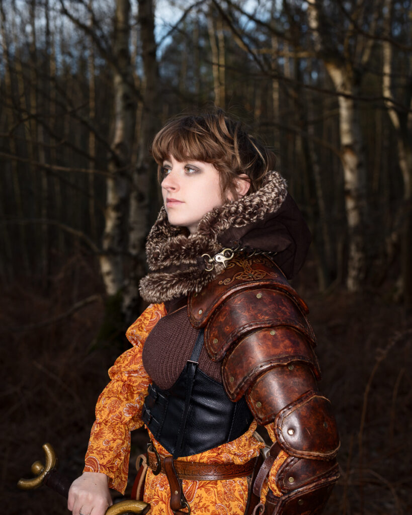 Person in medieval armour in forest