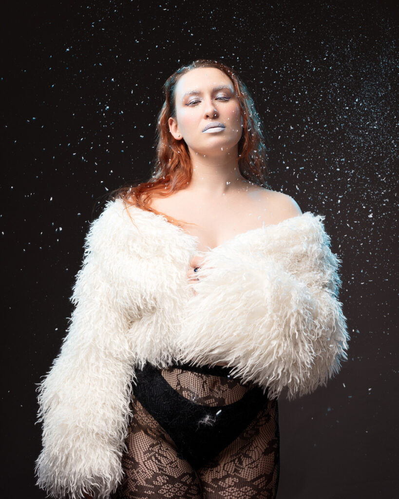 Woman in fur coat with snow effect