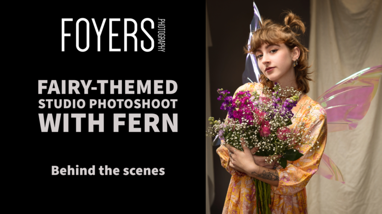 Fairy-themed studio photoshoot with flowers and wings.