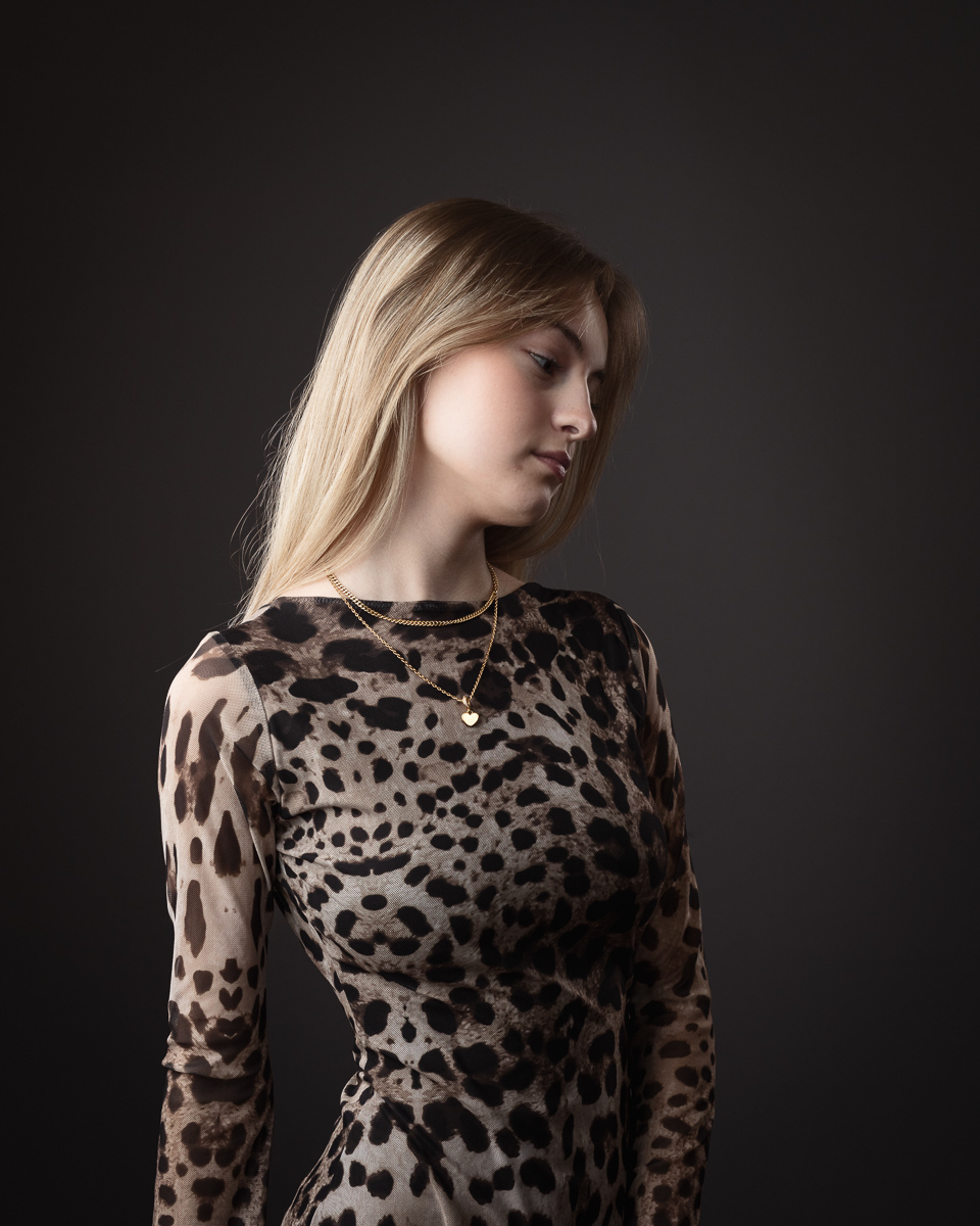 Person wearing animal print dress