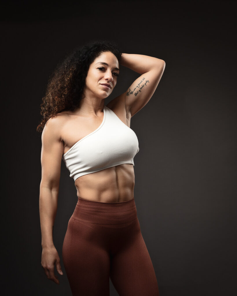 Athletic woman posing in fitness attire