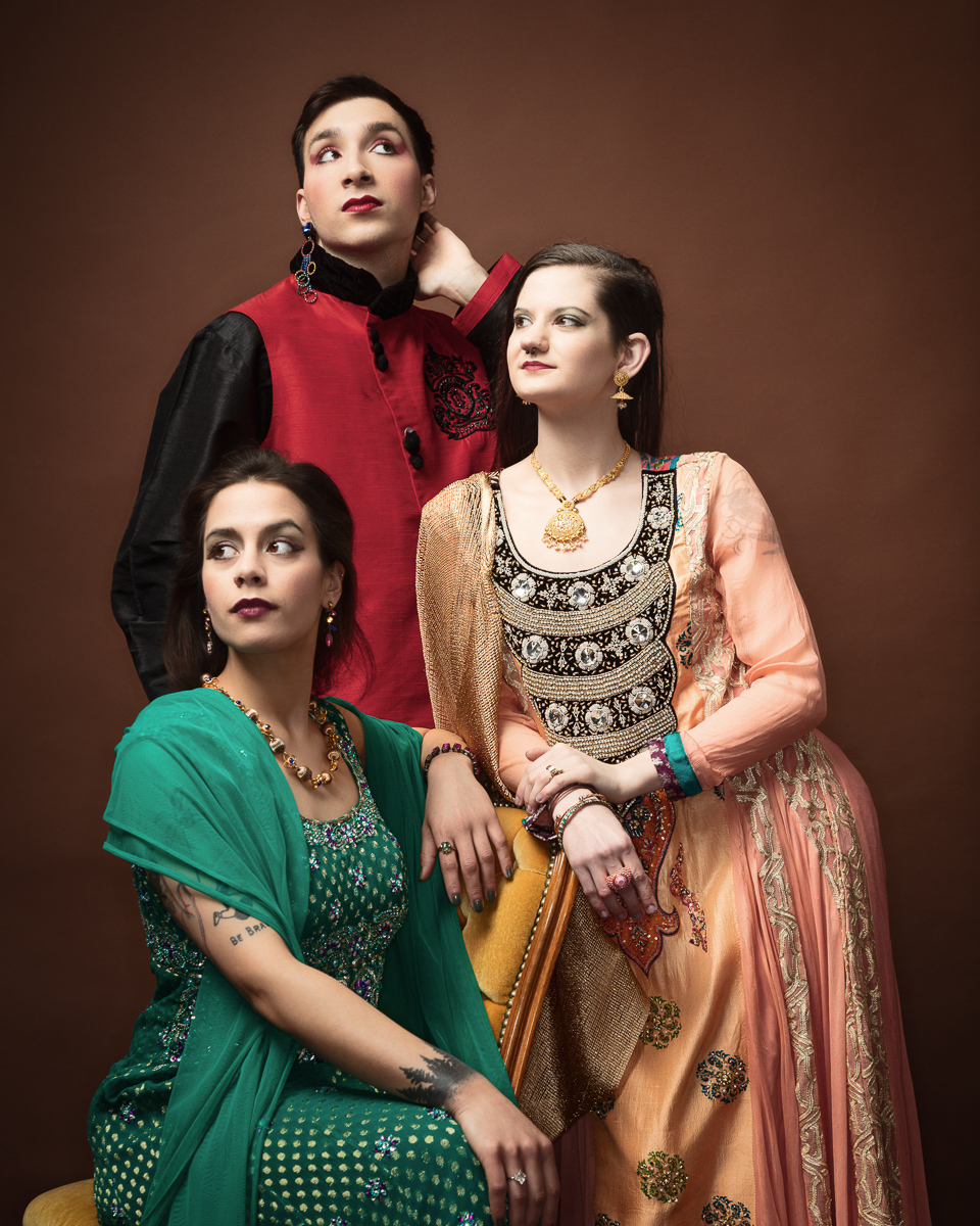 Fashion models in elegant traditional attire posing
