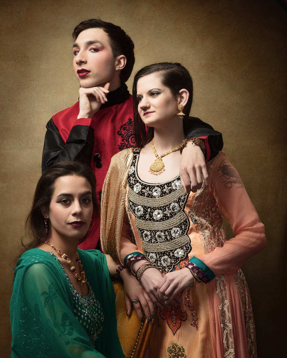 Elegant group in traditional attire, portrait photography.