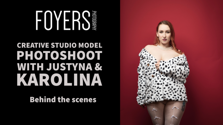 Model in spotted coat, red background photoshoot