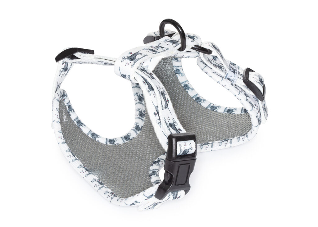 White dog harness with black buckle