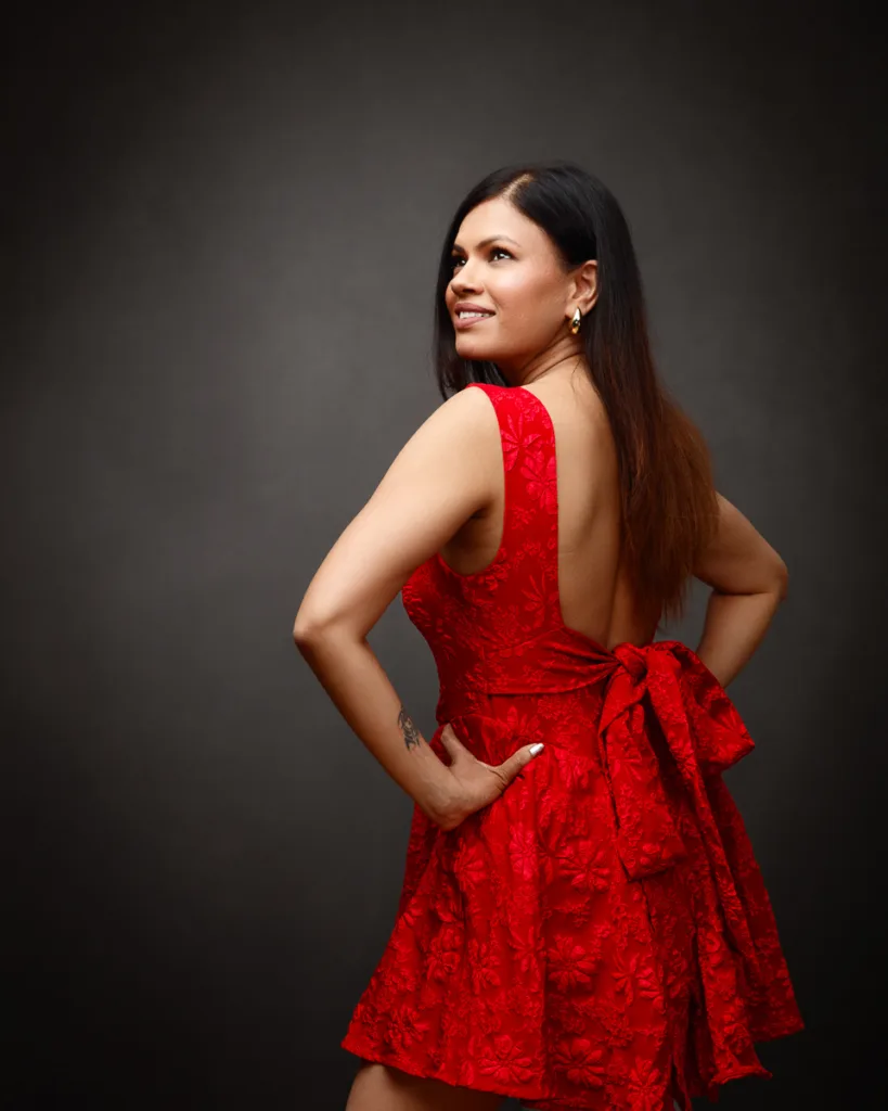 Woman in red dress smiling