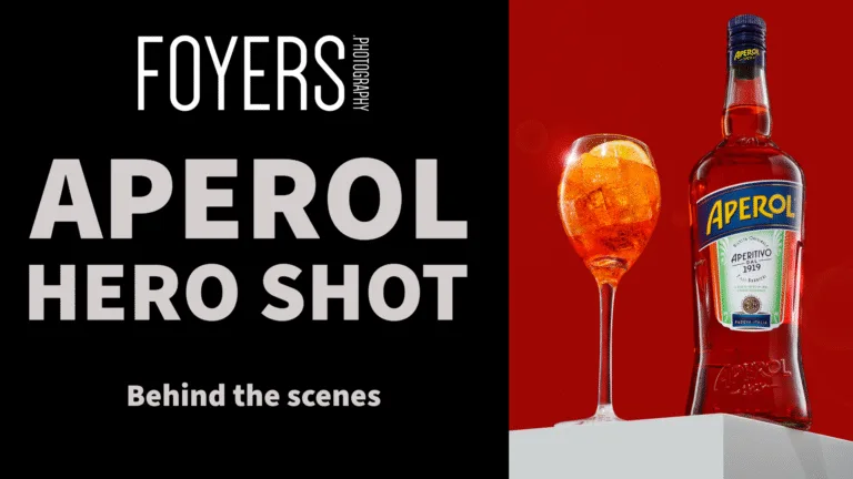 Aperol bottle and cocktail on display