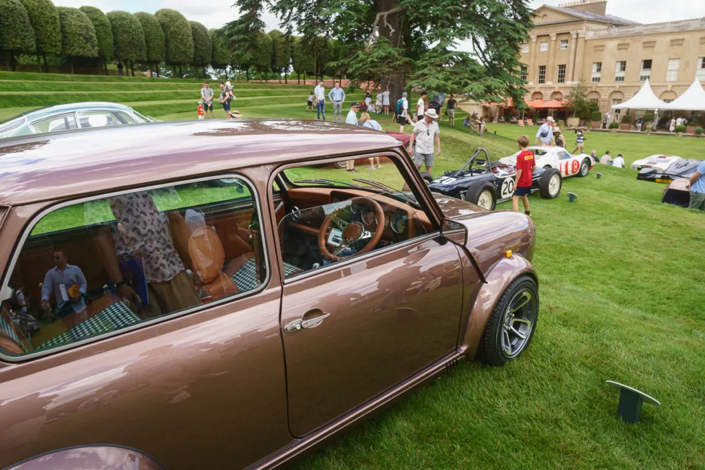 Classic cars displayed at outdoor event venue.