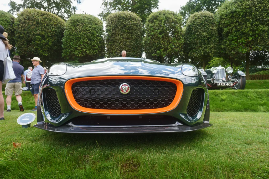 Front view of sleek sports car on display.