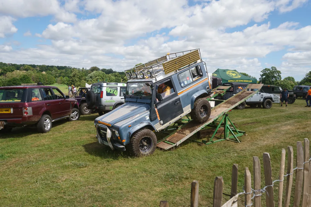 4x4 off-road vehicle climbing ramp at show