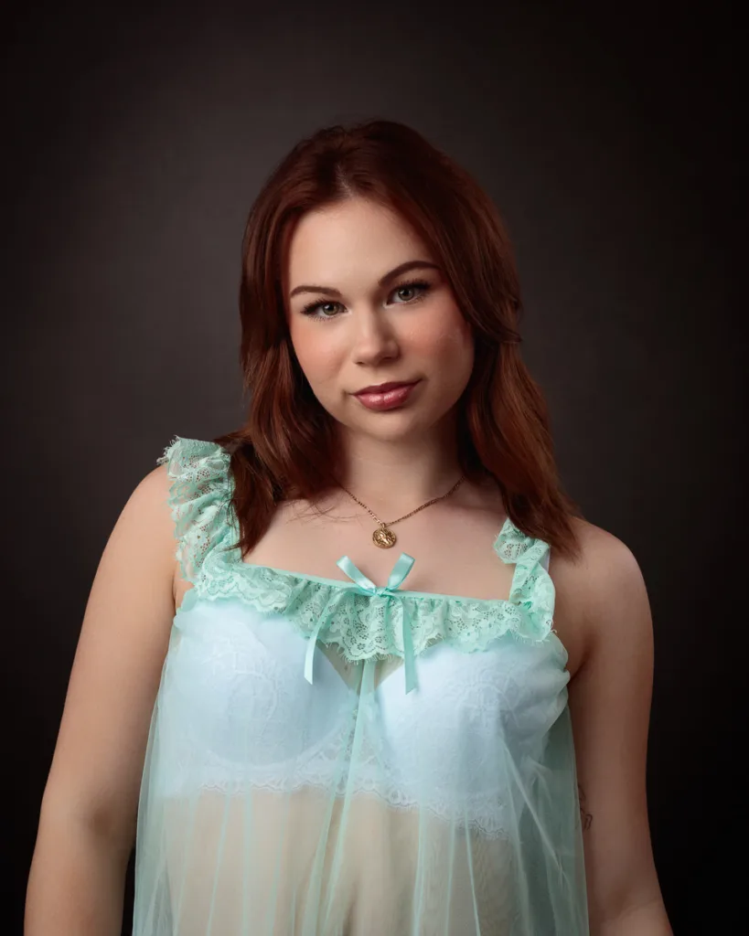 Woman in mint lace nightgown portrait