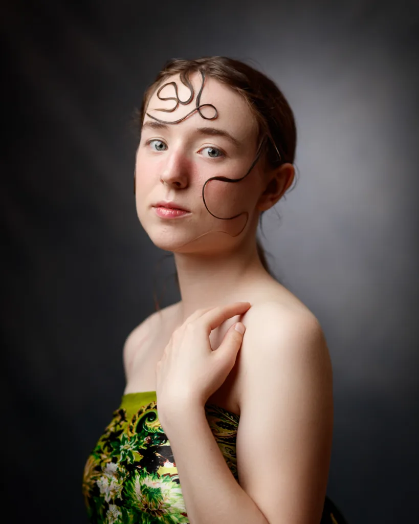Portrait of woman with artistic hair design