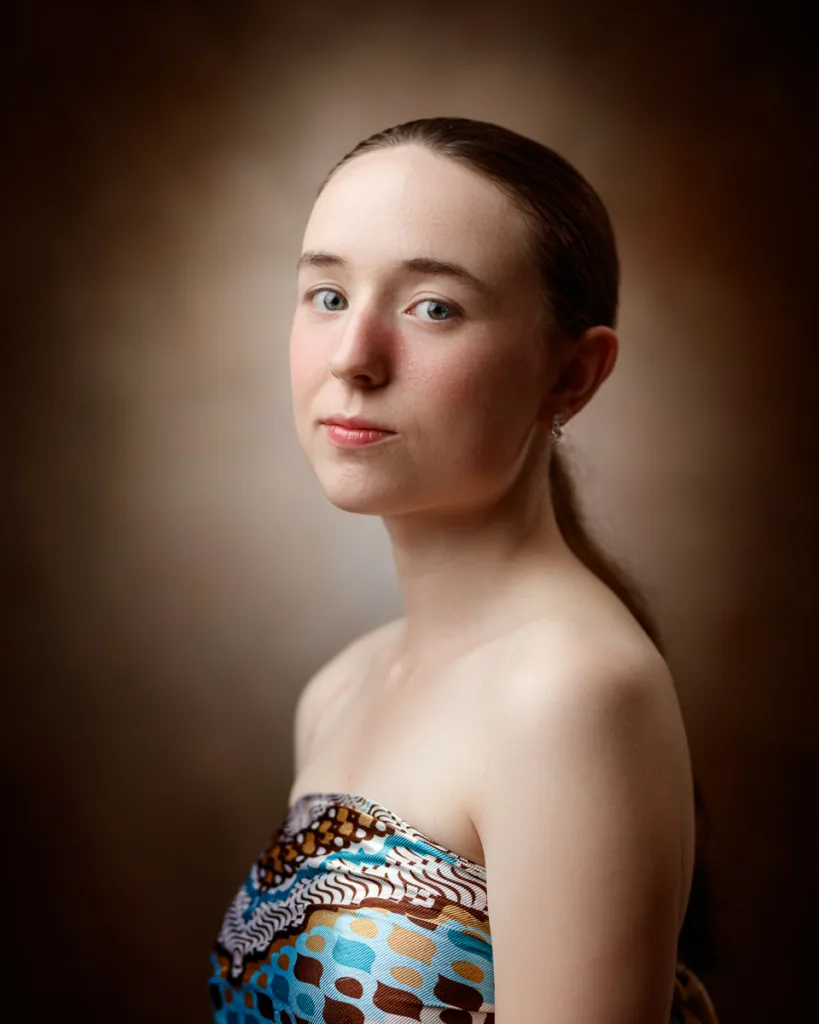 Woman in colourful strapless dress, soft lighting