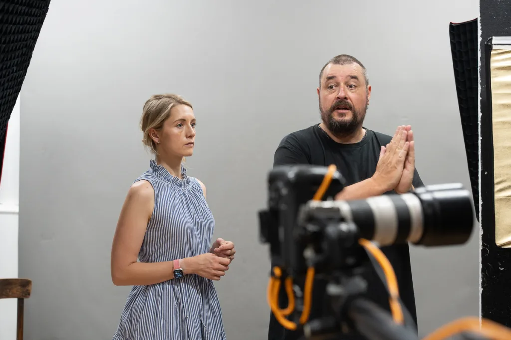 People in a photography studio setting