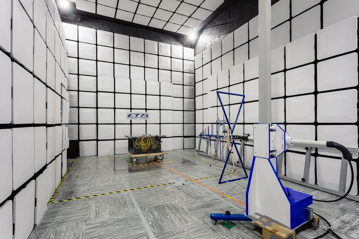Anechoic chamber with antennas and equipment.