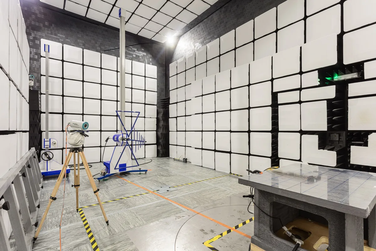 Anechoic test chamber with foam-lined walls, photographed for ETS EMC