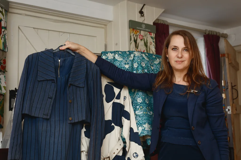 Woman displaying elegant blue and white clothing