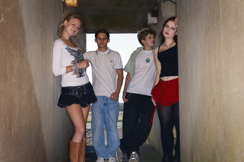 Group of young people standing in corridor