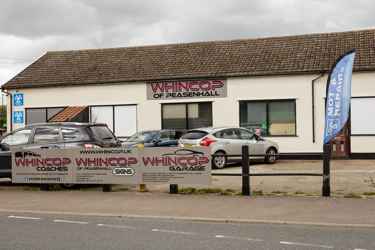 Whincop Garage Peasenhall with cars parked outside.