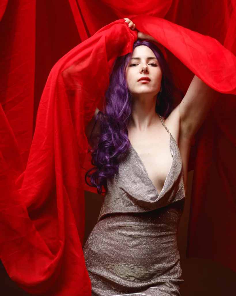 Woman in dress with red and purple elements
