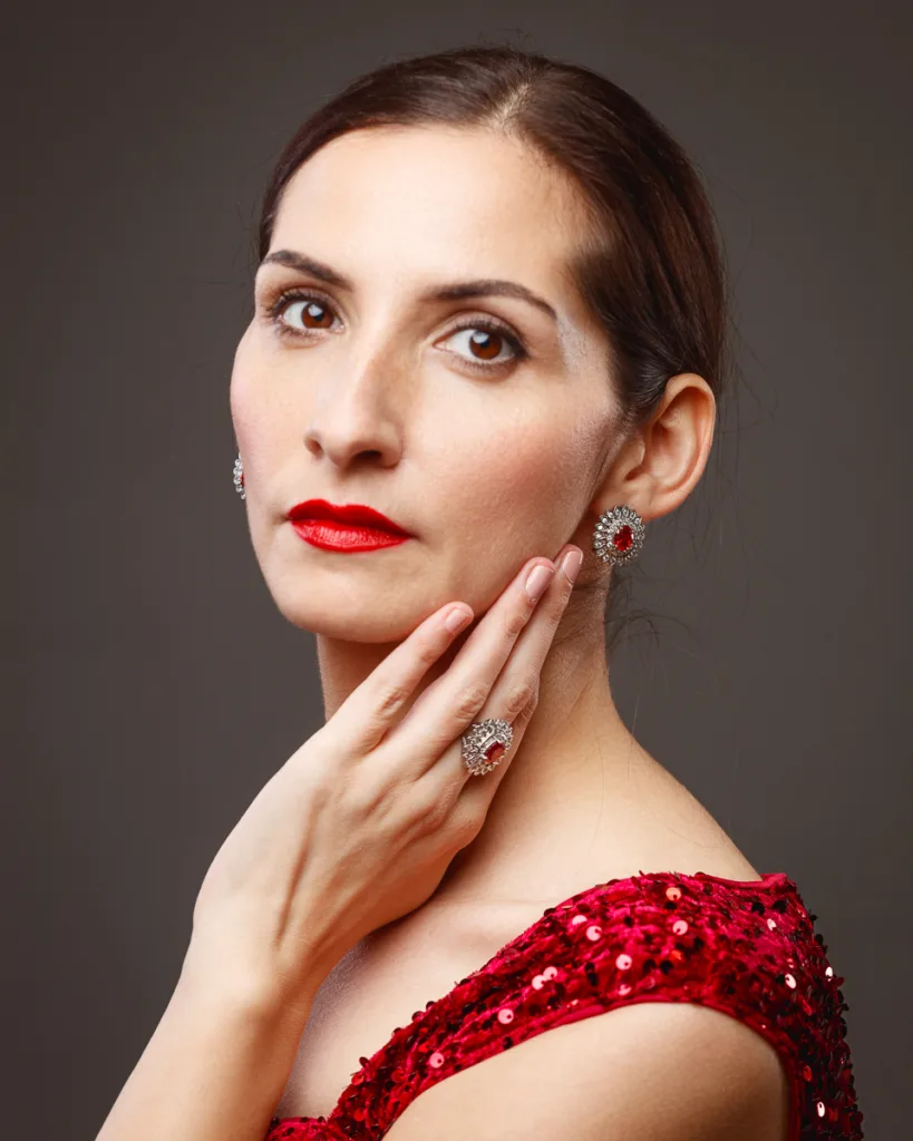 Woman in red dress with elegant jewellery