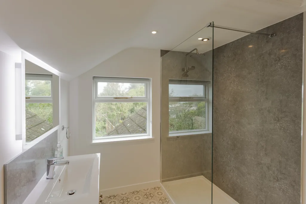 Modern bathroom with glass shower and vanity