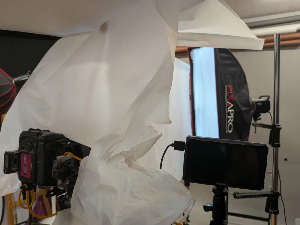 Photography studio setup with camera and softbox lighting