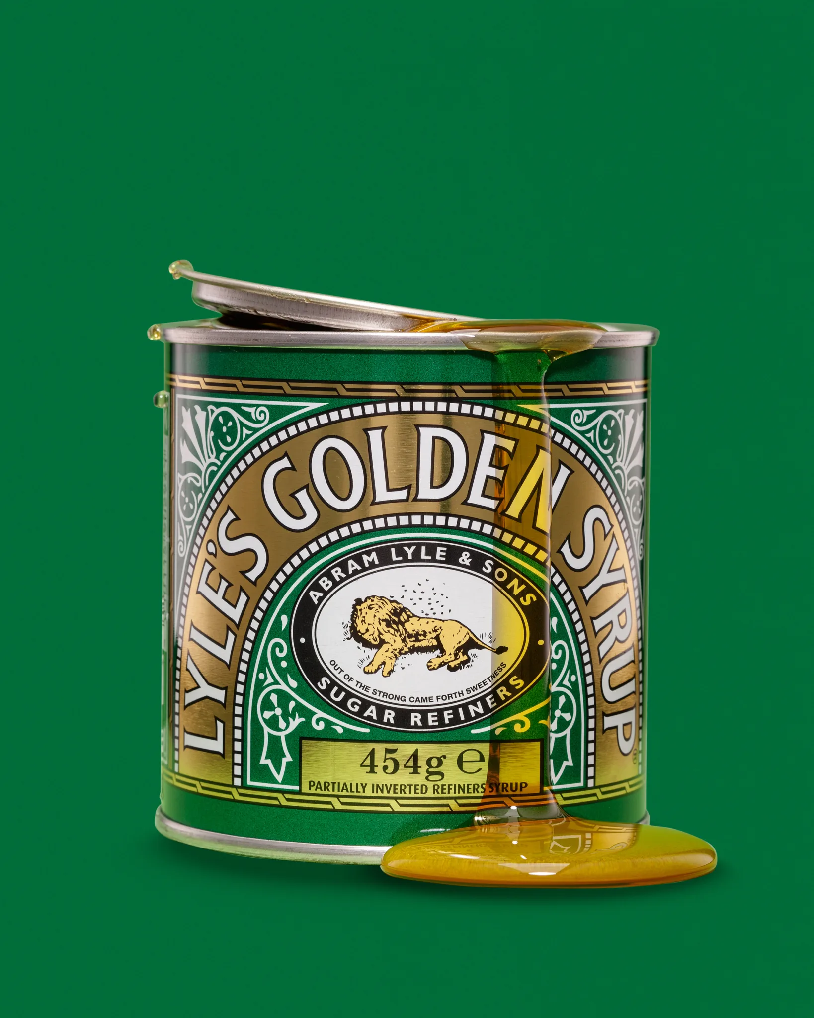Lyle’s Golden Syrup tin with syrup dripping