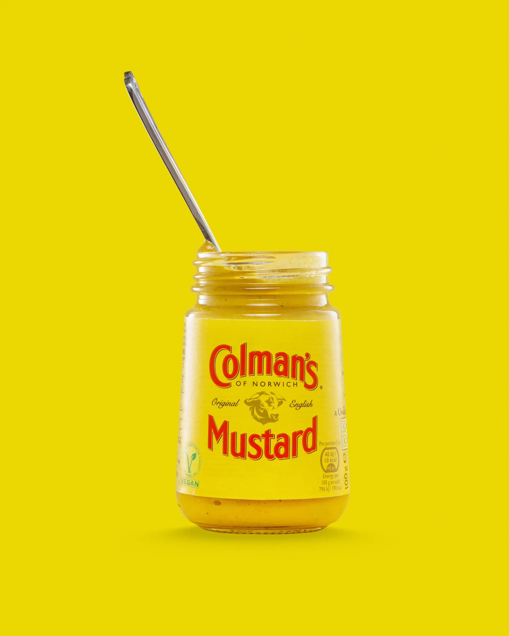 Jar of Colman's English mustard with spoon
