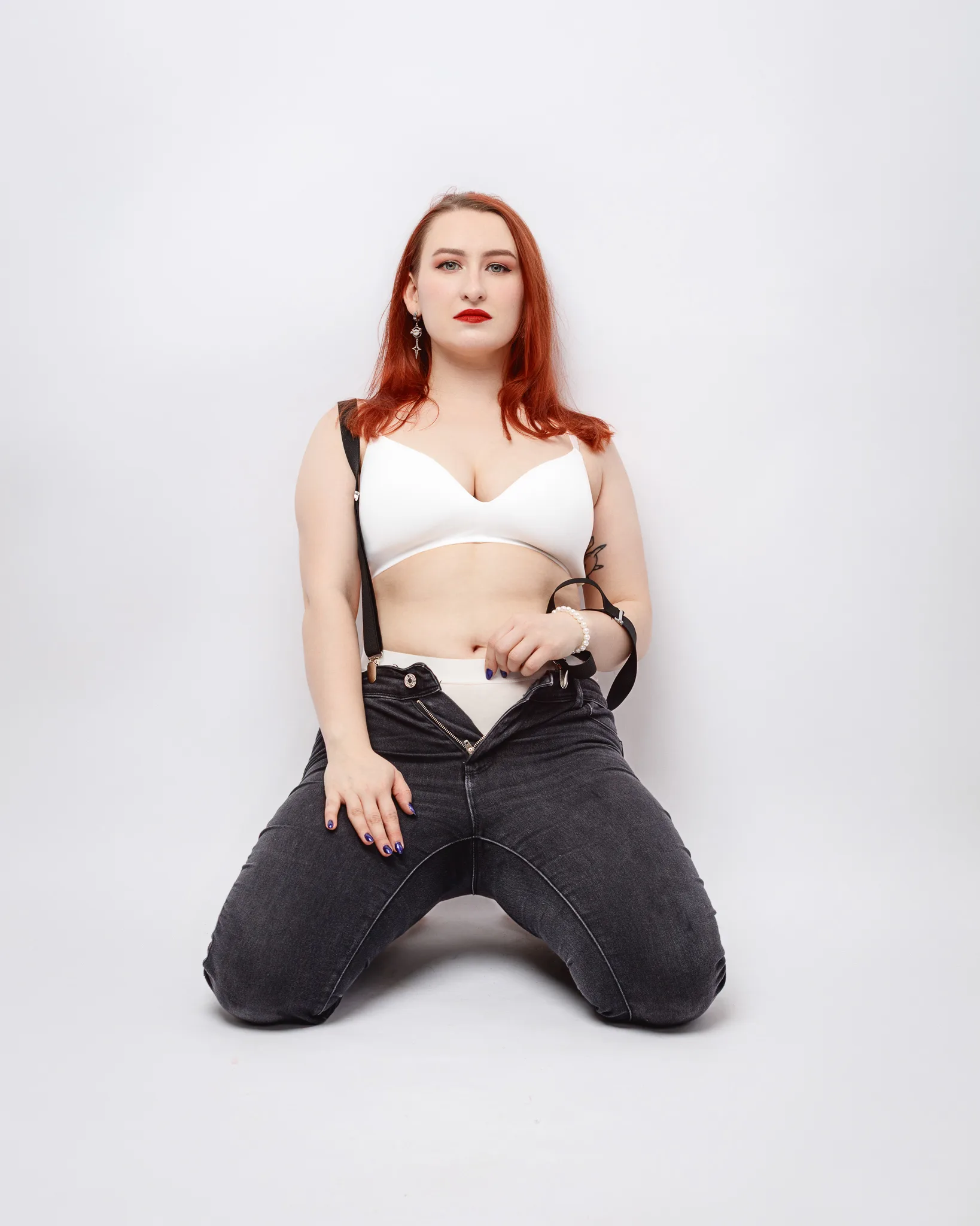 Person posing confidently in casual attire.