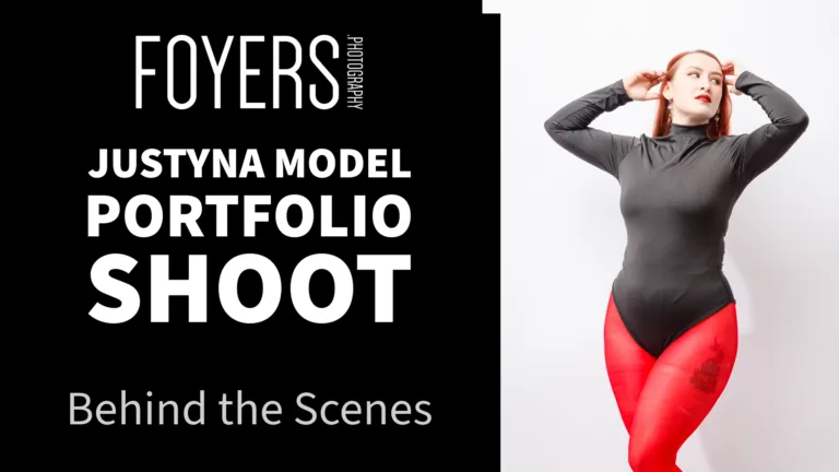 Model in red tights poses during photo shoot.