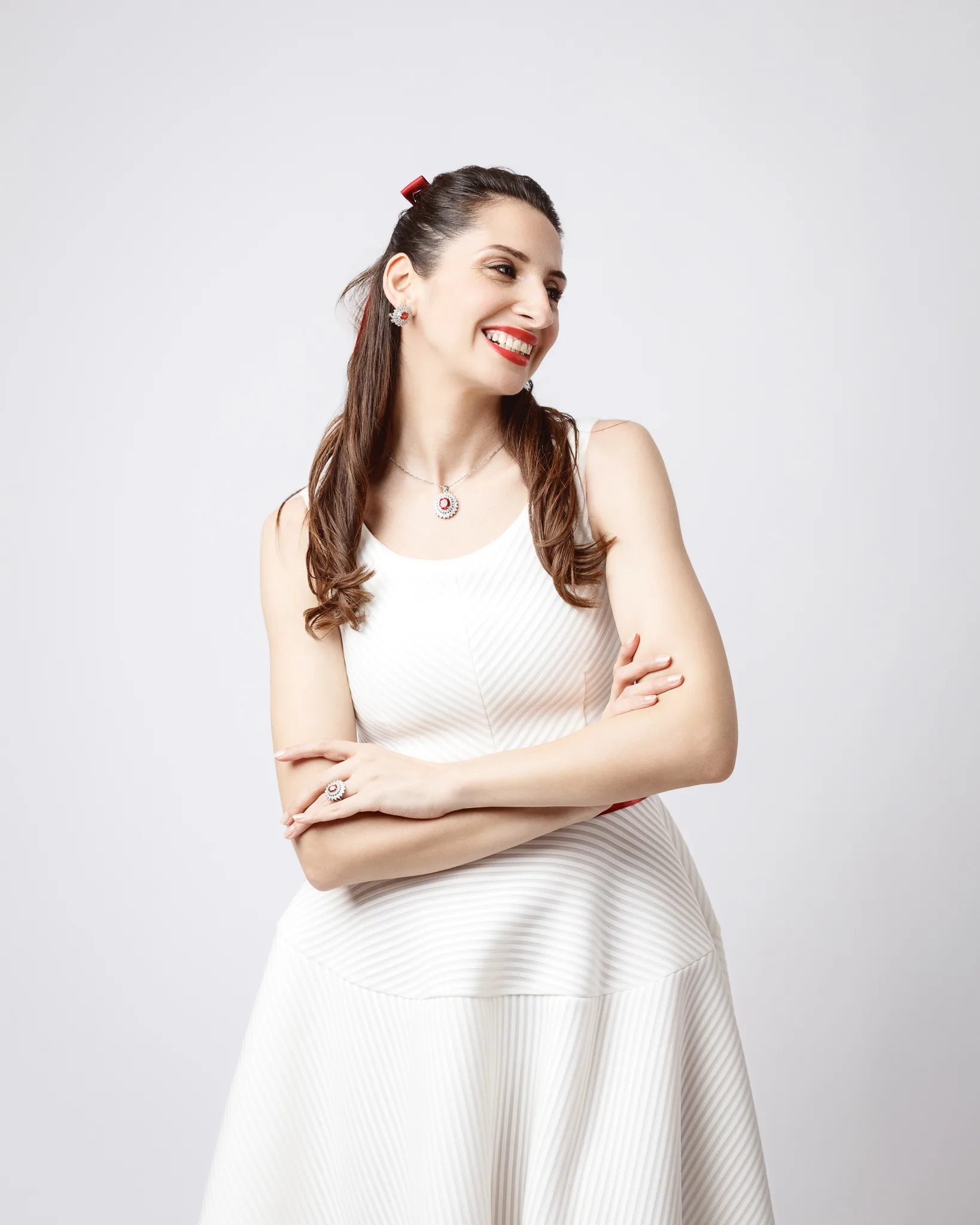 Smiling woman in white dress
