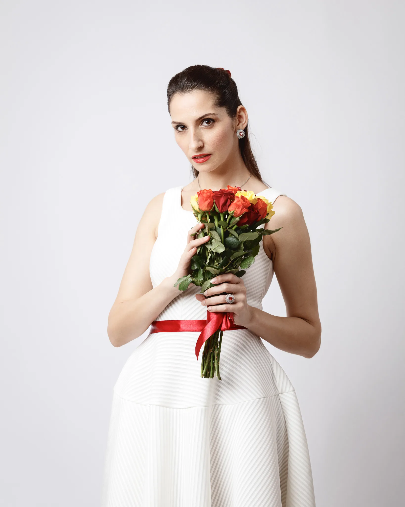 Woman holding a bouquet of roses