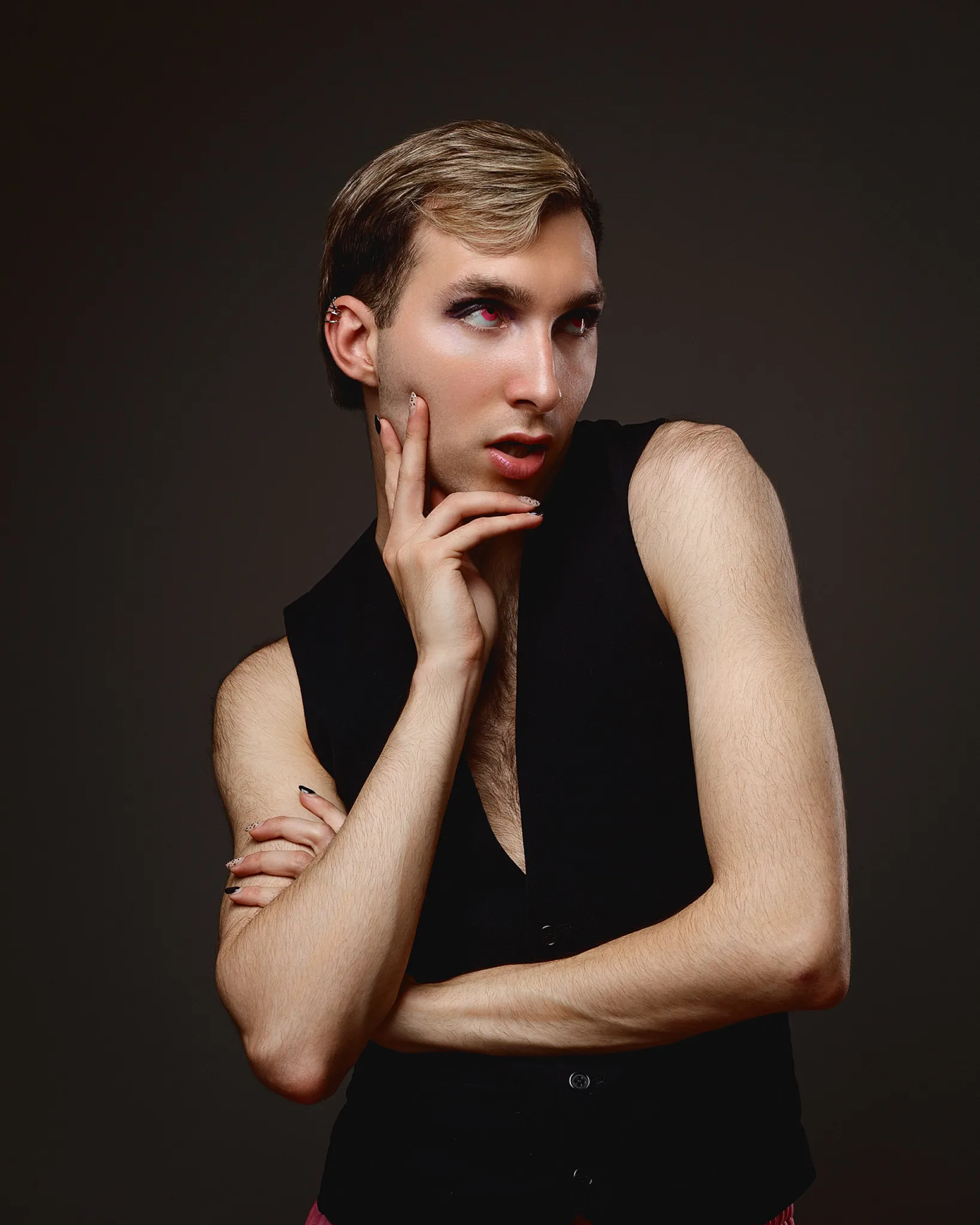 Person posing with thoughtful expression