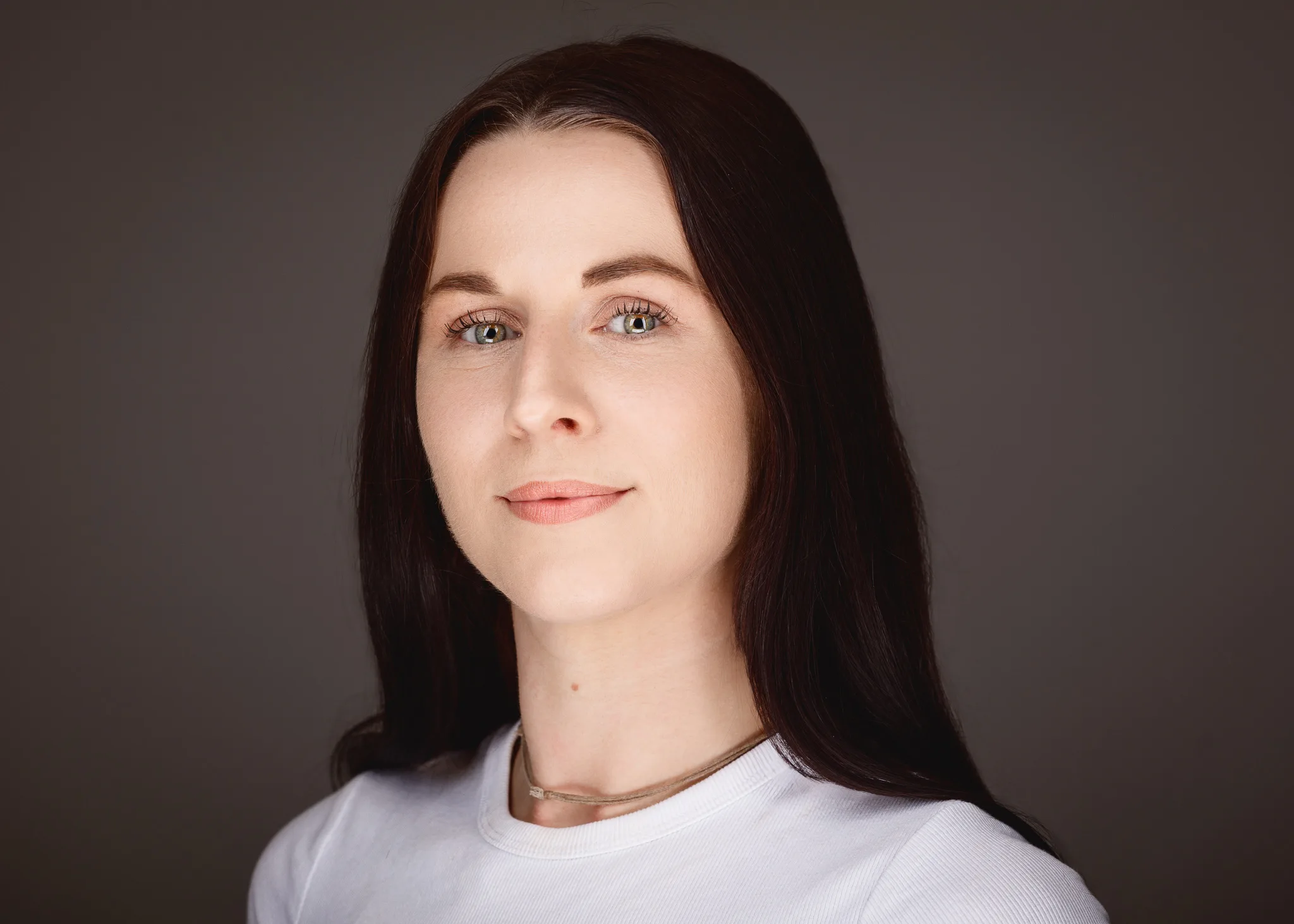 Portrait of woman with long dark hair