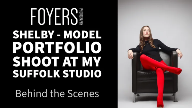 Model in red tights seated in studio chair