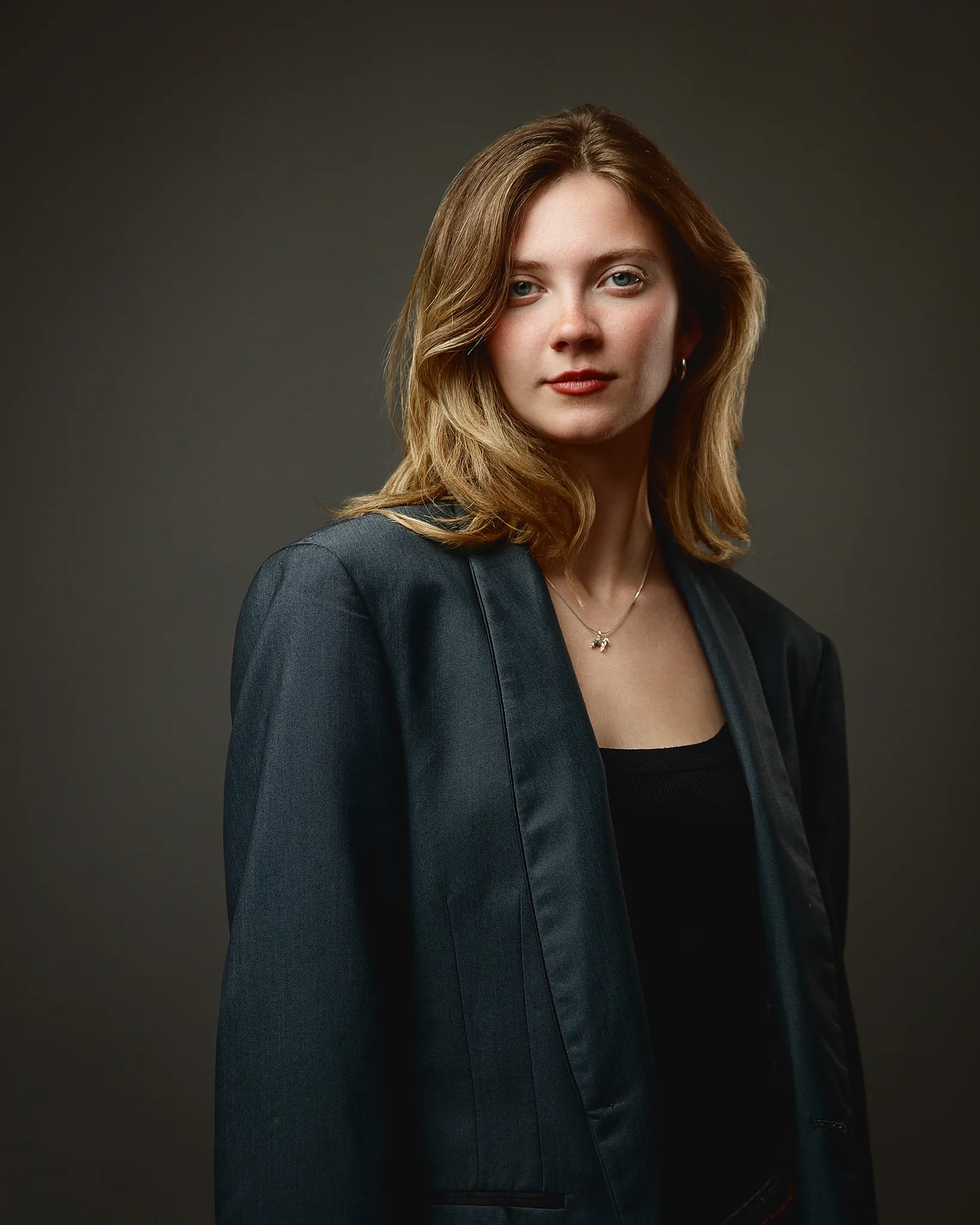 Professional LinkedIn headshot of a woman in business attire, Foyers Photography Suffolk