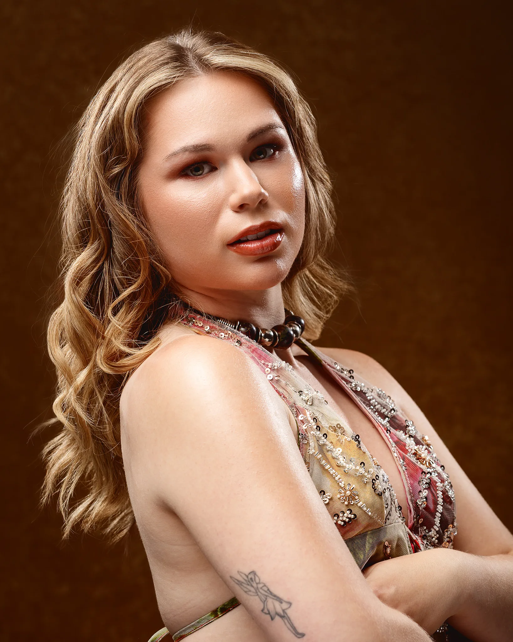 Woman with wavy blonde hair and red lipstick portrait
